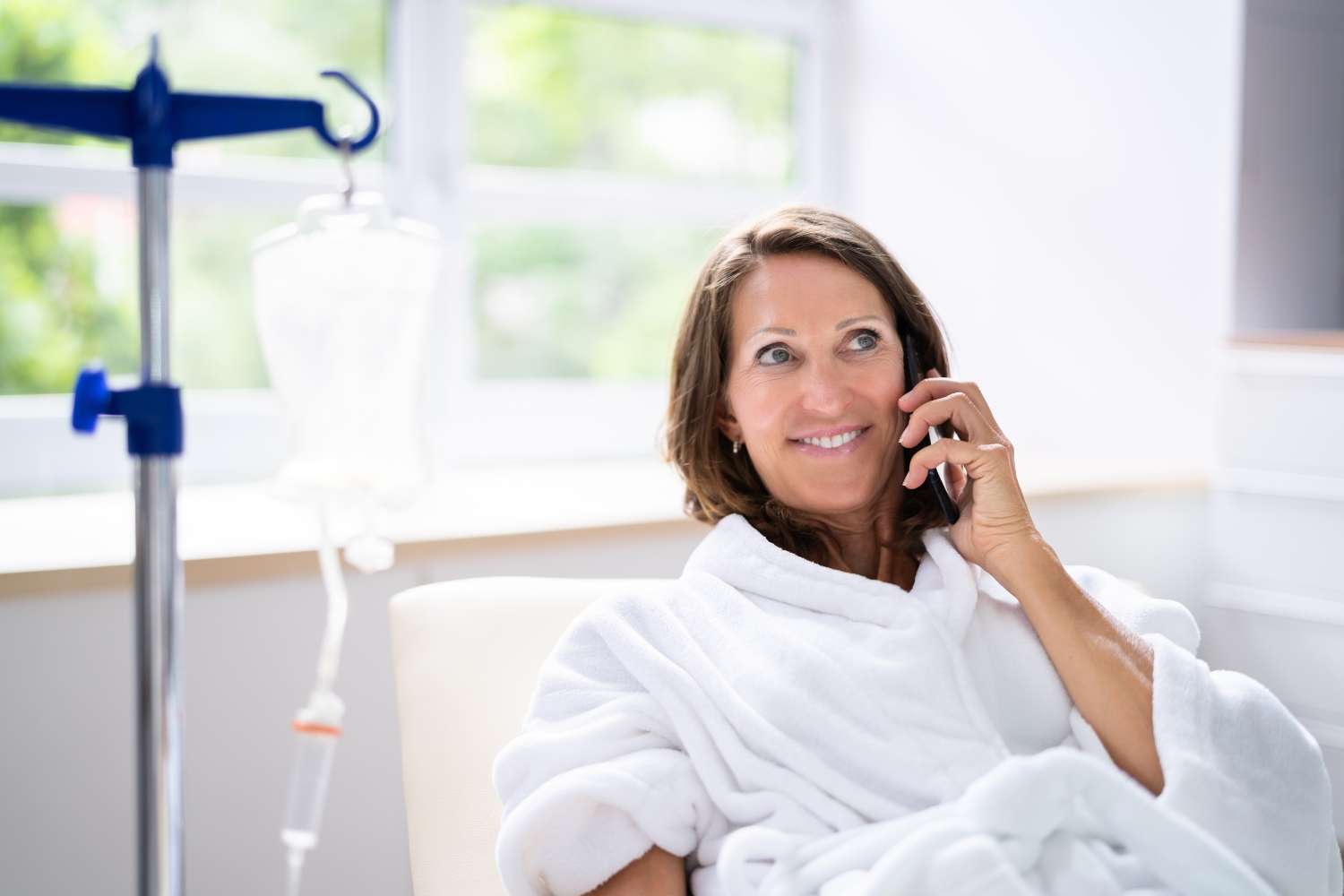 Charlotte ketamine therapy center QC Medispa treatment room with comfortable chair and medical equipment